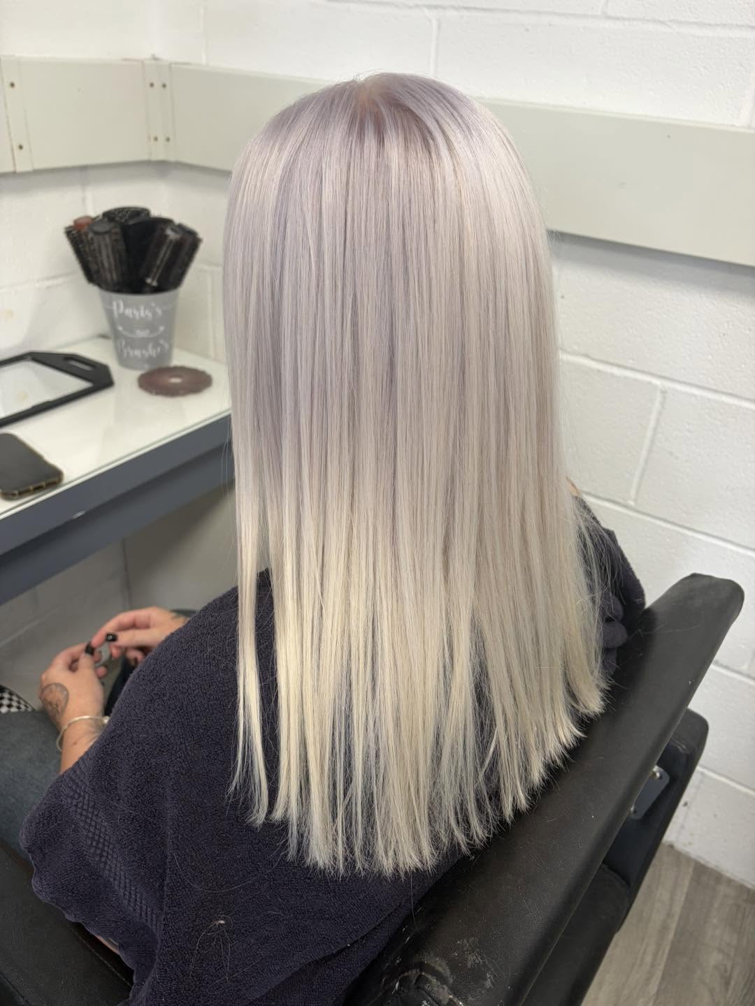 Fresh platinum blonde finish by Hair By Paris